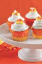 <p>The ultimate Halloween sweet, in cupcake form! Don't tell, but we might prefer that marshmallow frosting-topped version over the original candy.</p><p><em><a href="https://www.womansday.com/food-recipes/food-drinks/a28835151/candy-corn-cupcakes-recipe/" rel="nofollow noopener" target="_blank" data-ylk="slk:Get the recipe from Woman's Day »;elm:context_link;itc:0;sec:content-canvas" class="link ">Get the recipe from Woman's Day »</a></em></p>