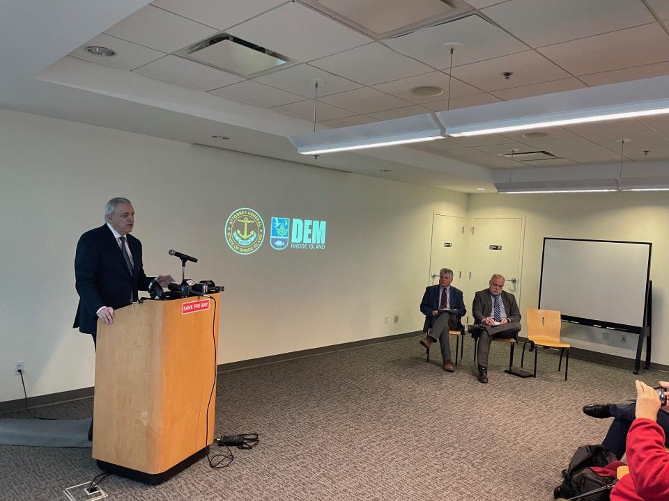 Attorney General Peter F. Neronha announces state action to address stormwater pollution in the Mashapaug Watershed. Save The Bay executive director Topher Hamblett and Department of Environmental Management director Terrence Gray are also pictured.