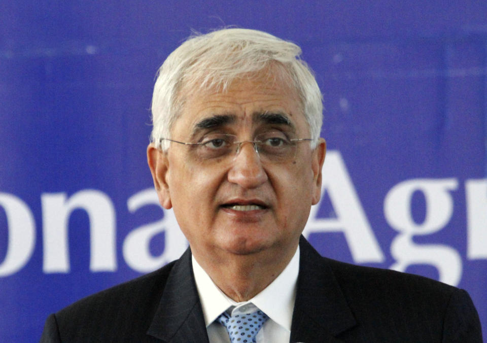 FILE - In this Saturday, Feb. 15, 2014, file photo, Indian Foreign Minister Salman Khurshid speaks at the inauguration ceremony of the Afghan National Agriculture Science and Technology University in Kandahar province south of Kabul, Afghanistan. The senior leader of India’s main opposition Congress party says the party’s struggles are to the point where it may not be able to win key upcoming state elections in 2019 or ensure its own future. Khurshid also says the party is facing attrition because it’s taking too long to come to terms with its defeat in May, 2019, national elections. (AP Photo/Allauddin Khan, File)