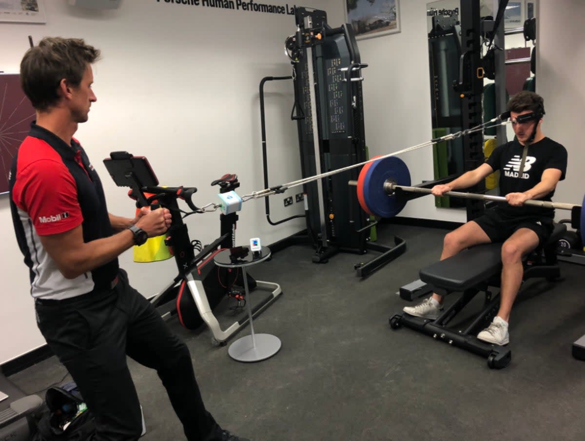 The Independent takes part in a neck strength test at  the Porsche Human Performance Centre at Silverstone   (Kieran Jackson )