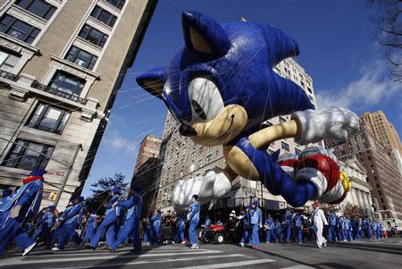 The Sonic the Hedgehog balloon floats down Central Park West during the 87th Macy's Thanksgiving Day Parade in New York November 28, 2013. REUTERS/Gary Hershorn