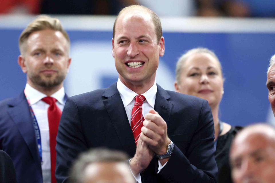 <p>Alex Livesey/Getty</p> Prince William cheers on Wales at the 2023 Rugby World Cup in France.
