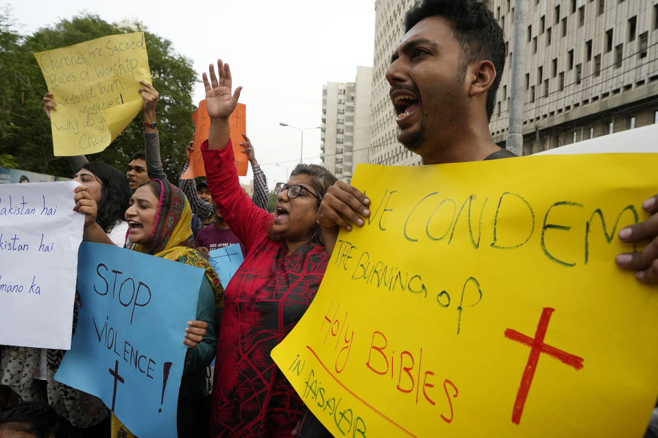 Members of Christian groups and others demonstrate to condemn the attack on a Christian area and a burned church by angry Muslim mob in Karachi, Pakistan, Wednesday, Aug. 16, 2023. A Muslim mob went on a rampage Wednesday, attacking a Christian area in eastern Pakistan, burning a church and damaging two others, police said. The attackers also demolished a man's house after accusing him of desecrating Islam's holy book and attacked several other Christian homes. (AP Photo/Fareed Khan)