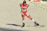 TOBLACH, ITALY - JANUARY 5: (FRANCE OUT) Devon Kershaw of Canada takes 1st place during the FIS Cross-Country World Cup Tour de Ski Men's Sprint on January 5, 2011 in Toblach, Italy. (Photo by Philippe Montigny/Agence Zoom/Getty Images)