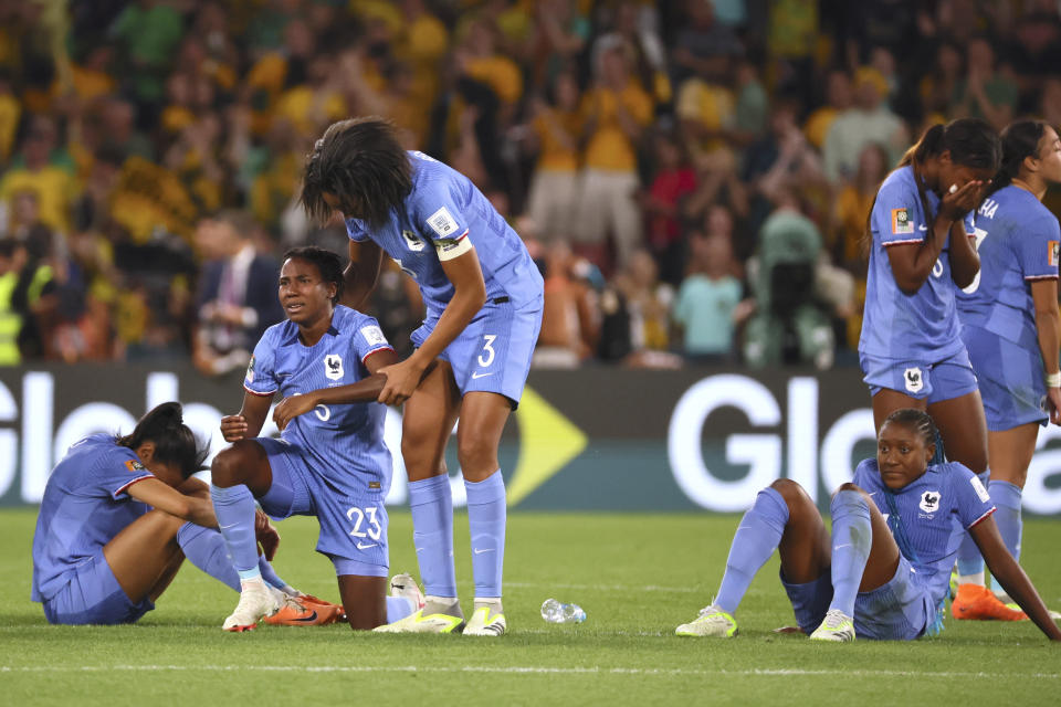 France players react disappointed at the end of the Women's World Cup quarterfinal soccer match between Australia and France in Brisbane, Australia, Saturday, Aug. 12, 2023. (AP Photo/Tertius Pickard)