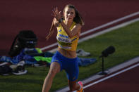 Yaroslava Mahuchikh, of Ukraine, competes during the women's high jump final at the World Athletics Championships on Tuesday, July 19, 2022, in Eugene, Ore. (AP Photo/Gregory Bull)