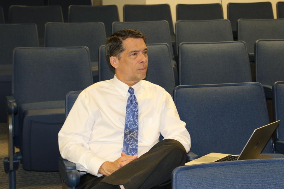 Southeast New Mexico College president Kevin Beardmore listens to a presentation from Carlsbad Municipal Schools superintendent Dr. Gerry Washburn on a proposed $300 million bond issue on March 14, 2024.