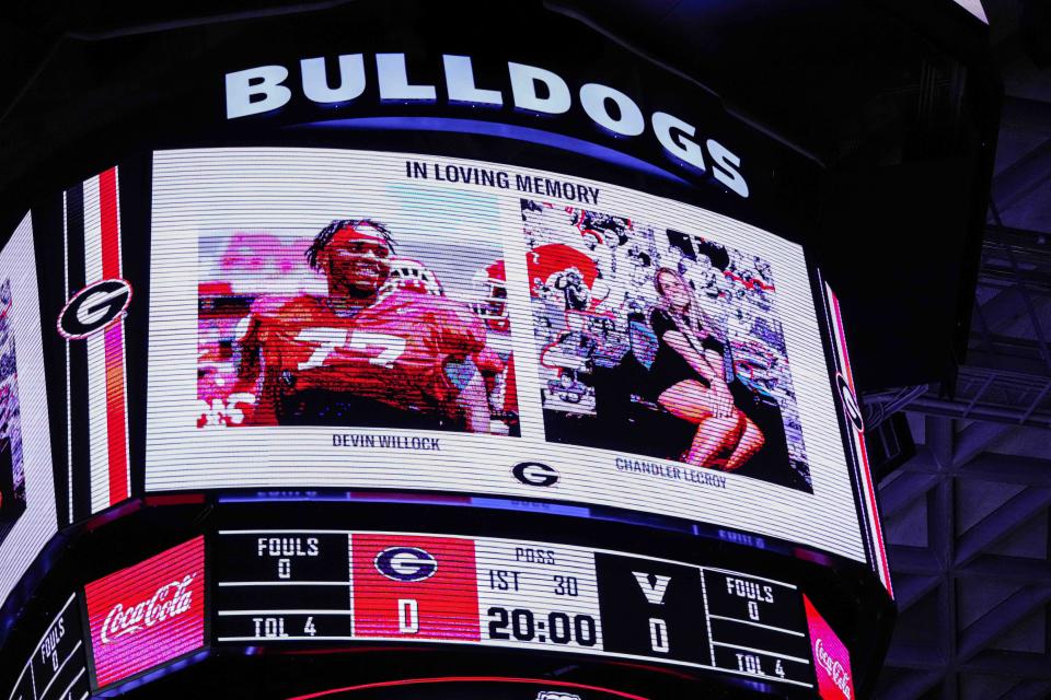 Jan 21, 2023; Athens, Georgia, USA; A scoreboard tribute and a moment of silence remembering Georgia Bulldogs football player Devin Willock and football staffer Chandler LeCroy prior to the basketball game against the Vanderbilt Commodores at Stegeman Coliseum. Mandatory Credit: Dale Zanine-USA TODAY Sports