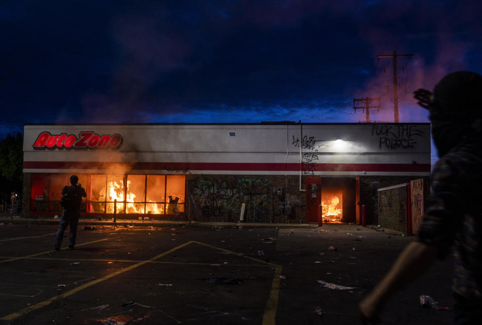 A fire burns inside of an Auto Zone store near the 3rd Police Precinct on May 27, 2020 in Minneapolis, Minnesota. / Credit: Stephen Maturen / Getty Images