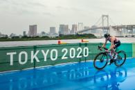 Great Britain’s Georgia Taylor-Brown tackles the weather en route to winning silver in the women's triathlon.