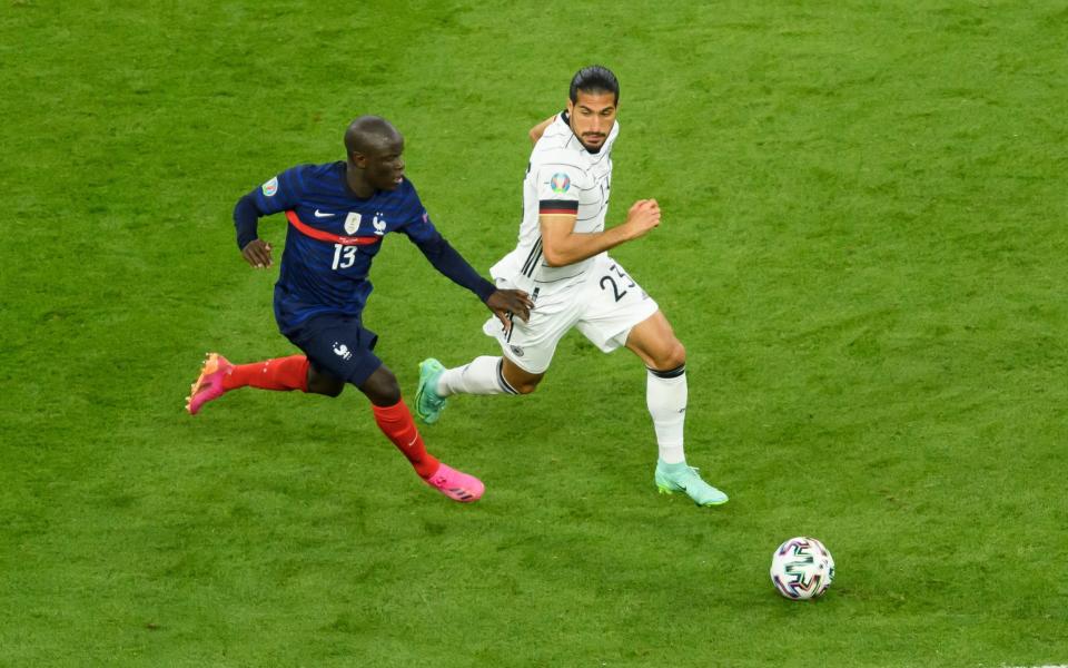 N'Golo Kante races past Germany's Emre Can - GETTY IMAGES