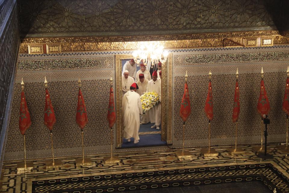Pope Francis pays a visit to the Mausoleum of King Mohammed V, in Rabat, Morocco, Saturday, March 30, 2019. Francis's weekend trip to Morocco aims to highlight the North African nation's tradition of Christian-Muslim ties while also letting him show solidarity with migrants at Europe's door and tend to a tiny Catholic flock on the peripheries. (AP Photo/Gregorio Borgia)
