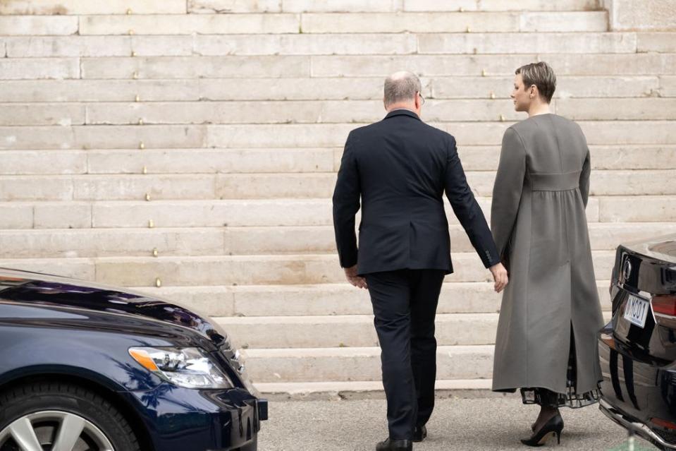 The couple held hands as they arrived at the service