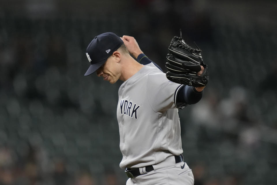 New York Yankees relief pitcher Ian Hamilton reacts after the last out to end the game in the ninth inning of a baseball game against the Detroit Tigers, Wednesday, Aug. 30, 2023, in Detroit. (AP Photo/Carlos Osorio)