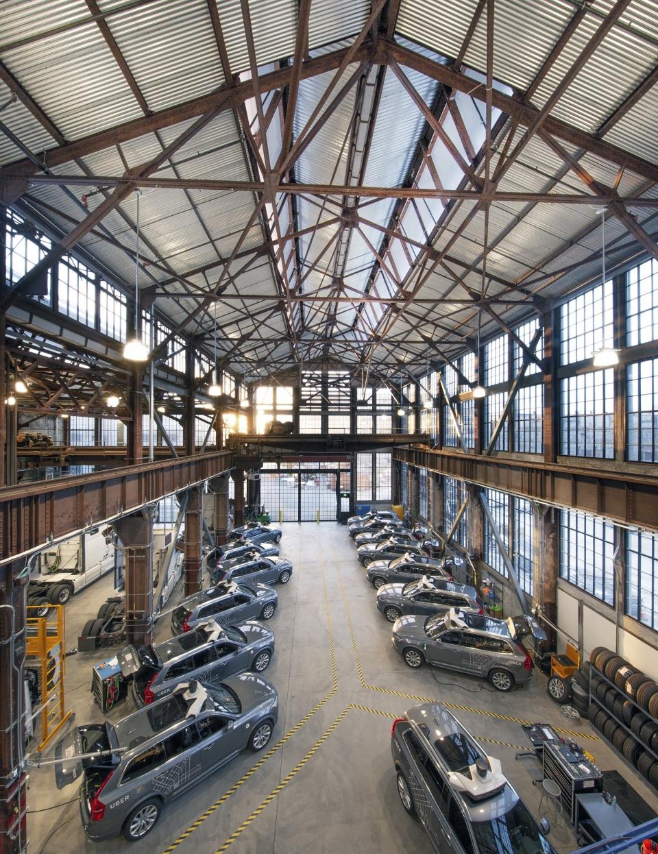 An aerial view of cars located with Uber's new office. The space will advance new technologies, such as self-driving cars.