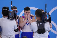 The Russian Olympic Committee's Nikita Nagornyy celebrates after winning the gold medal in the artistic men's team final at the 2020 Summer Olympics, Monday, July 26, 2021, in Tokyo. (AP Photo/Ashley Landis)