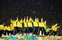 <p>Brazil line up to receive their gold medals after winning the Men’s Football Final between Brazil and Germany at the Maracana Stadium on Day 15 of the Rio 2016 Olympic Games on August 20, 2016 in Rio de Janeiro, Brazil. (Photo by Lars Baron/Getty Images) </p>