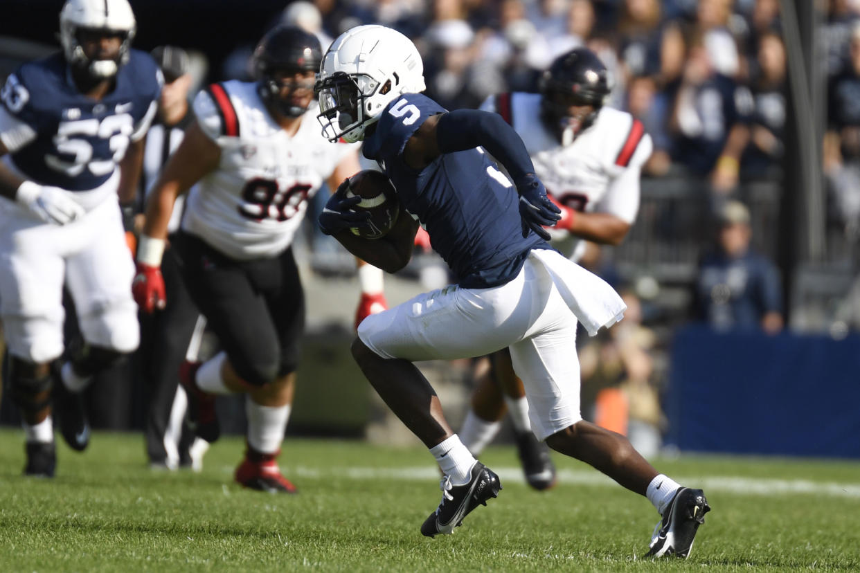 Penn State wide receiver Jahan Dotson (5) gains yardage during an NCAA college football game against Ball State in State College, Pa., on Saturday, Sept.11, 2021. (AP Photo/Barry Reeger)