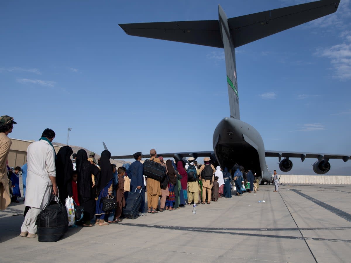 US Air Force loadmasters and pilots assigned to the 816th Expeditionary Airlift Squadron (via REUTERS)