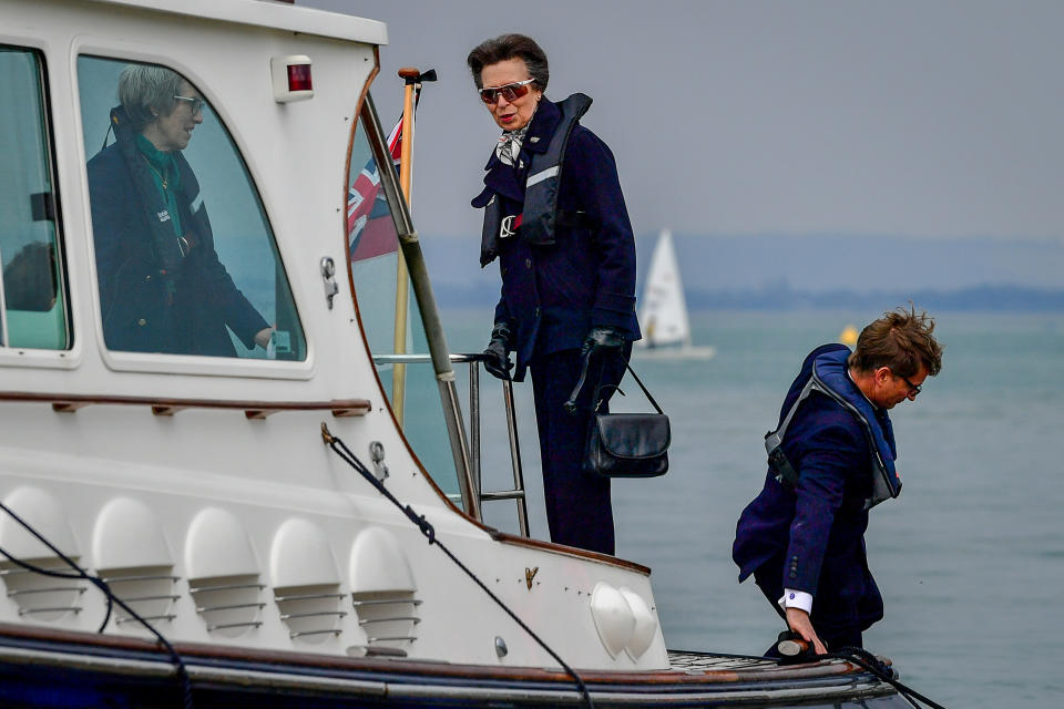 The Princess Royal arrives by boat to the Royal Victoria Yacht Club, on the Isle of Wight. Picture date: Wednesday April 14, 2021.