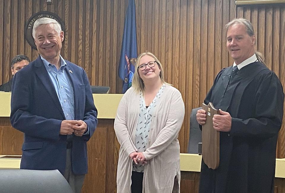 U.S. Congressman Fred Upton received the 2022 Liberty Bell Award this week. He is pictured with St. Joseph County Bar Association president Jordan Yancey and District Court Judge Jeffrey Middleton.