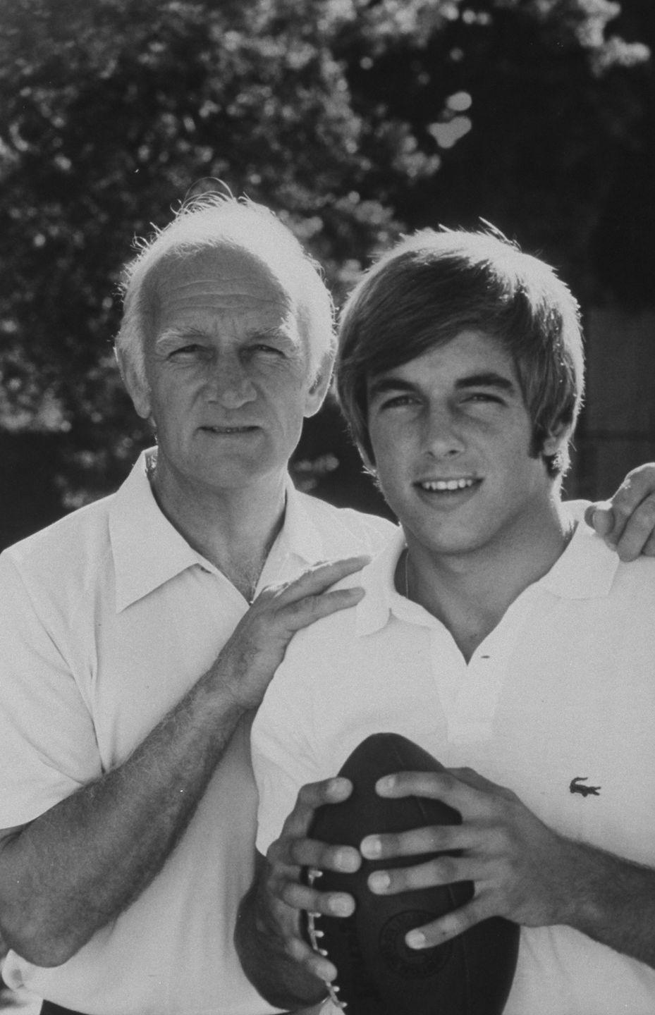 <p>Mark Harmon poses next to his father (University of Michigan football star Tom Harmon) in the early '70s, when the actor was <a href="https://footballfoundation.org/hof_scholars.aspx?hof=779" rel="nofollow noopener" target="_blank" data-ylk="slk:quarterback at the University of California at Los Angeles;elm:context_link;itc:0;sec:content-canvas" class="link ">quarterback at the University of California at Los Angeles</a>. Mark turned down offers to play in the NFL and instead pursued a career in acting, which seems to be going well for him.</p>
