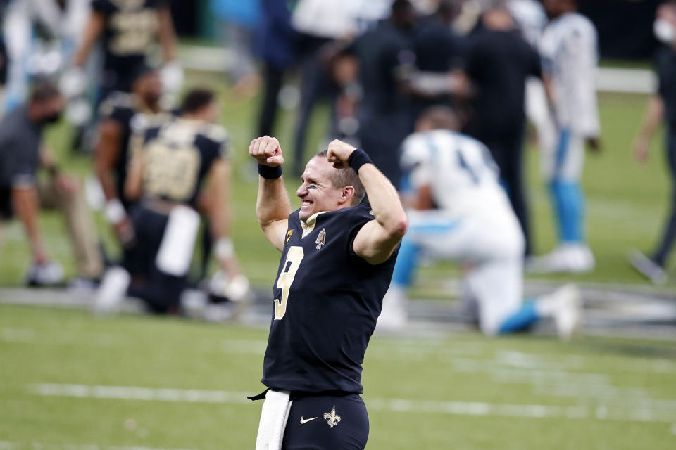 New Orleans Saints quarterback Drew Brees (9) reacts to the crowd after defeating the Carolina Panthers in a NFL football game in New Orleans, Sunday, Oct. 25, 2020. The Saints won 27-24. (AP Photo/Butch Dill)