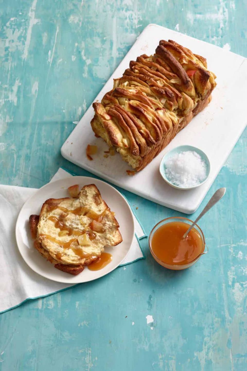 <p>Good luck with stopping at one slice of this sticky-sweet bread topped with caramel, apple, cinnamon, and brown sugar.</p><p><a href="https://www.womansday.com/food-recipes/food-drinks/recipes/a12431/apple-cinnamon-pull-apart-bread-recipe-wdy0315/" rel="nofollow noopener" target="_blank" data-ylk="slk:Get the recipe from Woman's Day »;elm:context_link;itc:0;sec:content-canvas" class="link "><em>Get the recipe from Woman's Day »</em></a><br></p>