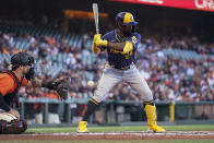 Milwaukee Brewers' Andrew McCutchen (24) strikes out looking against San Francisco Giants starting pitcher Alex Wood during the first inning of a baseball game in San Francisco, Friday, July 15, 2022. (AP Photo/Godofredo A. Vásquez)