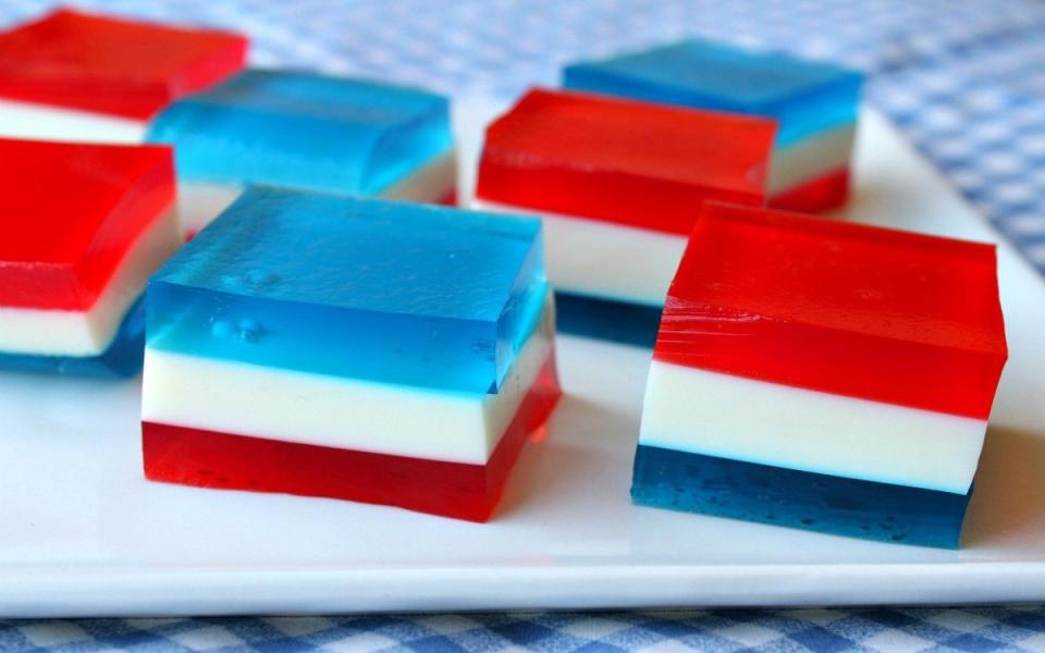 <p>Parade</p><p>No one will ever guess how much healthier this pretty, rainbow-colored Jell-O salad is! It’s high in protein…and incredibly easy to make! It's a light 4th of July dessert your guests will love. Plus the red, white and blue layers make this a perfect healthy 4th of July treat. <a href="/21440/lorilange/red-white-and-blue-finger-jell-o-recipe/" data-ylk="slk:Click HERE for recipe;elm:context_link;itc:0;sec:content-canvas" class="link "><strong>Click HERE for recipe</strong></a></p>