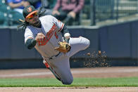 Baltimore Orioles shortstop Freddy Galvis (2) throws to second to hold the runner on base during the third inning of a baseball game against the New York Mets, Wednesday, May 12, 2021, in New York. (AP Photo/Kathy Willens)