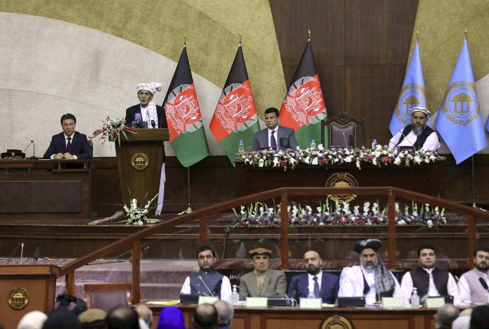 Afghan President Ashraf Ghani, second left, speaks at the extraordinary meeting of the Parliament in Kabul, Afghanistan, Monday, Aug. 2, 2021. (AP Photo/Rahmat Gul)