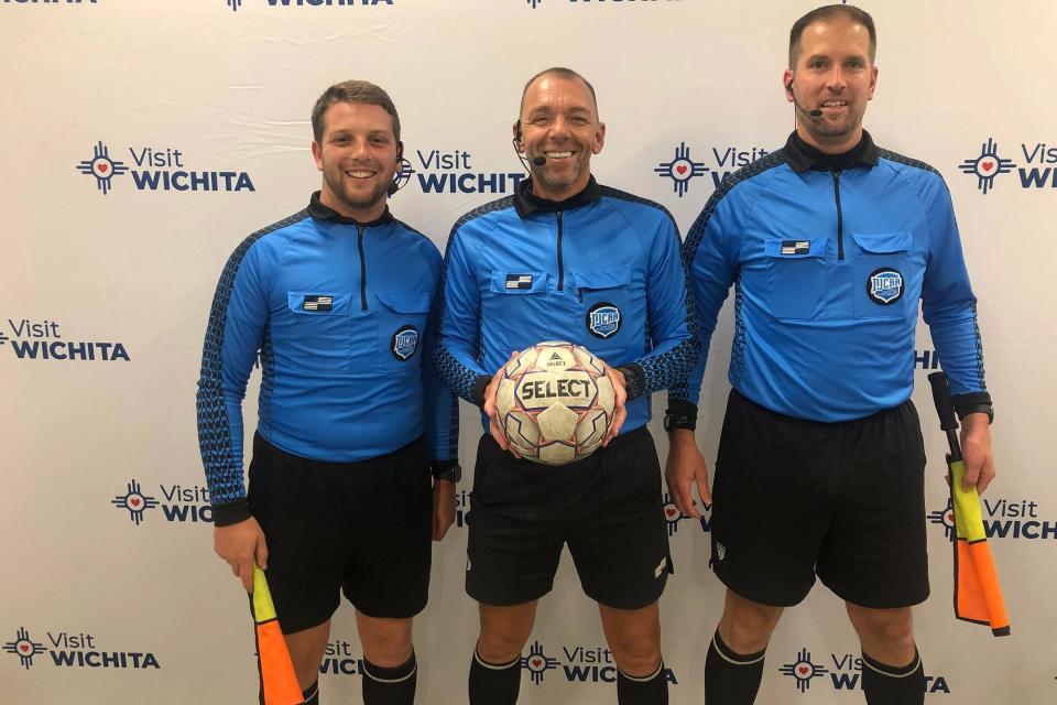 Brian Barlow (center) recruits, teaches and mentors soccer officials in the Tulsa area.