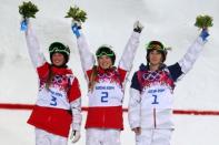 Silver medalist Chloe Dufour-Lapointe of Canada, gold medalist Justine Dufour-Lapointe of Canada and bronze medalist Hannah Kearney of the United States