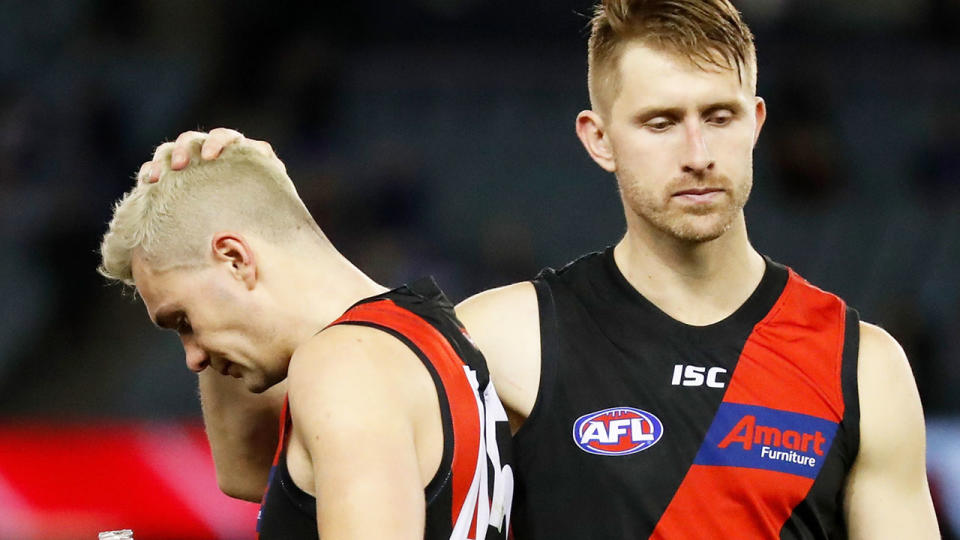 Shaun McKernan, pictured on the right, says Bombers fans were right to boo their team after an embarrassing display against the Bulldogs.