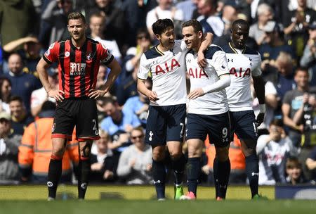 Britain Soccer Football - Tottenham Hotspur v AFC Bournemouth - Premier League - White Hart Lane - 15/4/17 Tottenham's Vincent Janssen celebrates scoring their fourth goal with Son Heung-min Reuters / Dylan Martinez Livepic