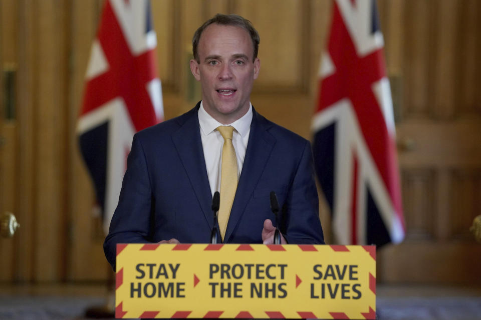 In this handout photo provided by 10 Downing Street, Britain's Foreign Secretary Dominic Raab speaks during a media briefing on coronavirus in Downing Street, London, Tuesday, April 7, 2020. British Prime Minister Boris Johnson remained in intensive care Tuesday with coronavirus at the NHS St Thomas' Hospital in central London. The new coronavirus causes mild or moderate symptoms for most people, but for some, especially older adults and people with existing health problems, it can cause more severe illness or death. (Pippa Fowles/10 Downing Street via AP)