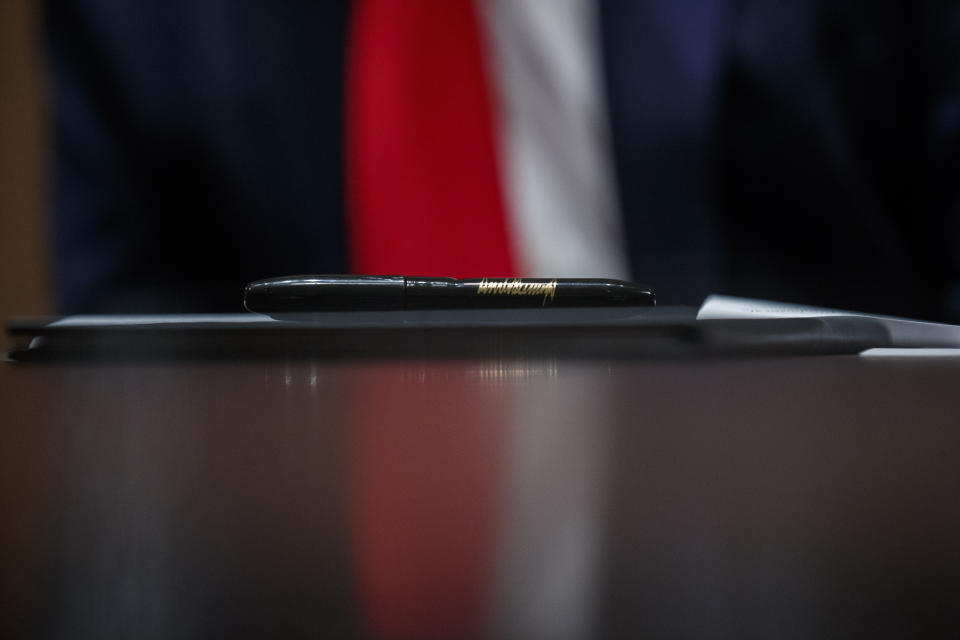 A pen to be used by President Donald Trump rests upon an executive order during a meeting with U.S. tech workers Monday at the White House. Trump later signed the order to prioritize hiring American workers during the economic crisis. (Photo: Alex Brandon/ASSOCIATED PRESS)