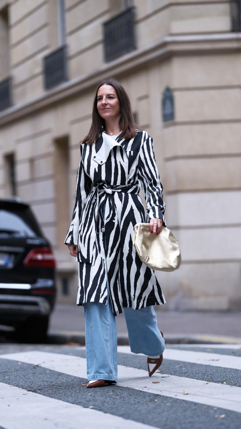 With a statement coat