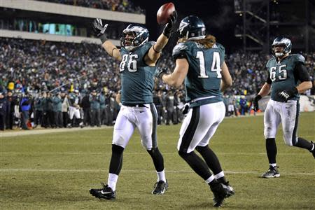 Jan 4, 2014; Philadelphia, PA, USA; Philadelphia Eagles tight end Zach Ertz (86) celebrates a touchdown against the New Orleans Saints during the second half of the 2013 NFC wild card playoff football game at Lincoln Financial Field. Mandatory Credit: Joe Camporeale-USA TODAY Sports