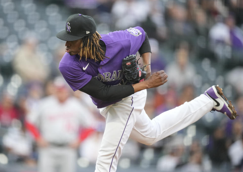 Colorado Rockies starting pitcher Jose Urena works against the Washington Nationals during the first inning of a baseball game Friday, April 7, 2023, in Denver. (AP Photo/David Zalubowski)