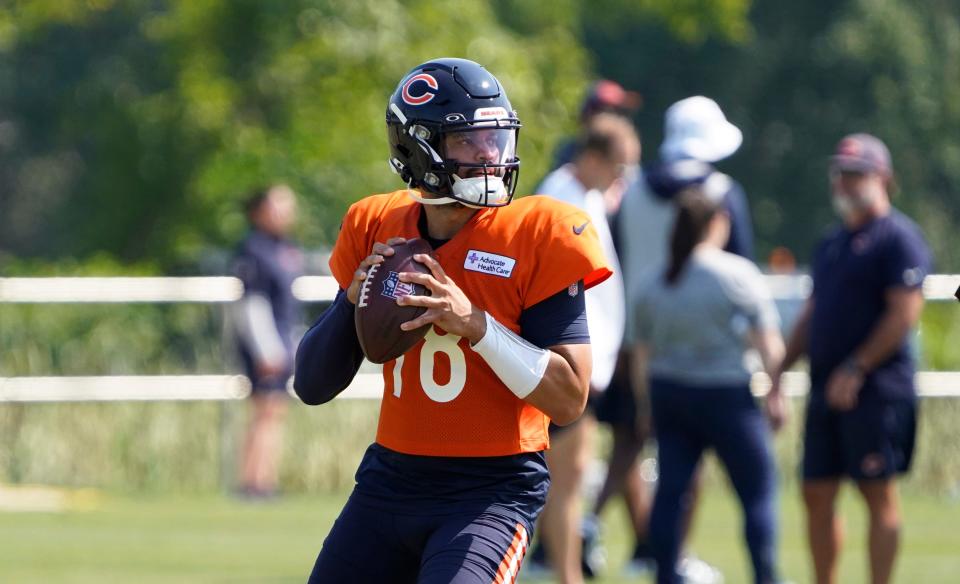 Jul 27, 2024; Lake Forest, IL, USA; Chicago Bears quarterback Caleb Williams (18) throws a pass during Chicago Bears Training Camp at Halas Hall. Mandatory Credit: David Banks-USA TODAY Sports