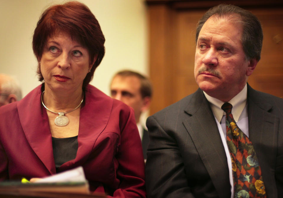 Victoria Toensing, left, and Joe diGenova listen as  former CIA agent Valerie Plame Wilson testifies before the House Oversight and Government Reform Committee on Capitol Hill Friday, March 16, 2007. (Photo: The Washington Post via Getty Images)