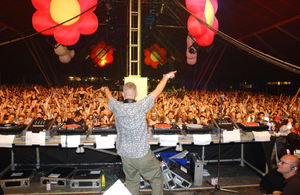 DJ Fatboy (Norman Cook) Slim performs to an upbeat crowd at Liverpool Creamfields 2001 festival, on Old Liverpool Airfield.      cre2