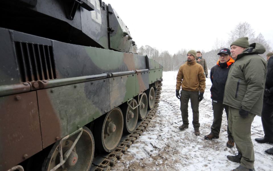 Arvydas Anusauskas, the Lithuanian defence minister, attends the testing of a Leopard tank