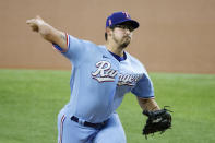 Texas Rangers starting pitcher Dane Dunning throws against the Seattle Mariners during the first inning of a baseball game Sunday, May 9, 2021, in Arlington, Texas. (AP Photo/Michael Ainsworth)