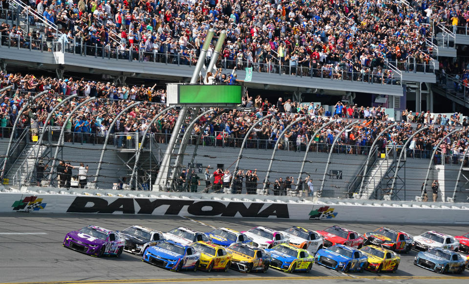 Alex Bowman (48) and  driver Kyle Larson (5) lead the field to the start of the 2023 Daytona 500.