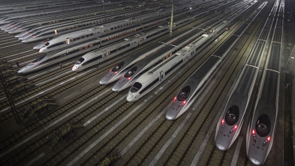 Hundreds of high-speed trains at a maintenance base await departure on January 20, 2018 in Wuhan, China. -Wang He/Getty Images