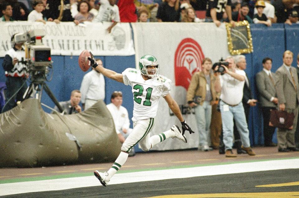 Philadelphia Eagles cornerback Eric Allen celebrates after a fourth-quarter interception return for a touchdown against the Saints in an NFC Wild Card game, Jan. 3, 1993, in New Orleans. The Eagles won 36-20.