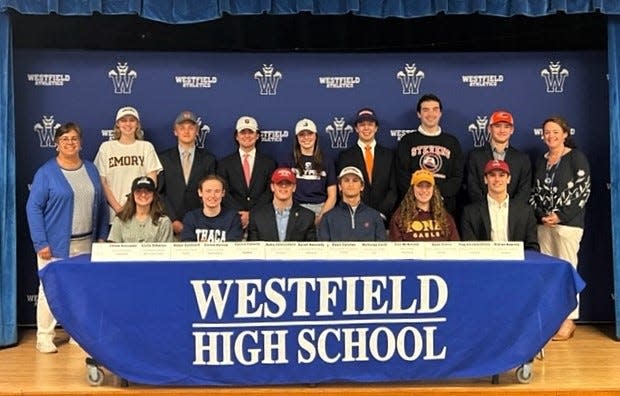 Sixteen Westfield High School student-athletes signed Letters of Intent with colleges and universities. Not pictured are Charlie Stock, Jack Walter and Conor Daly.